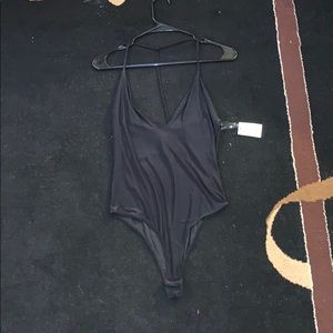 NWT. Black bodysuit